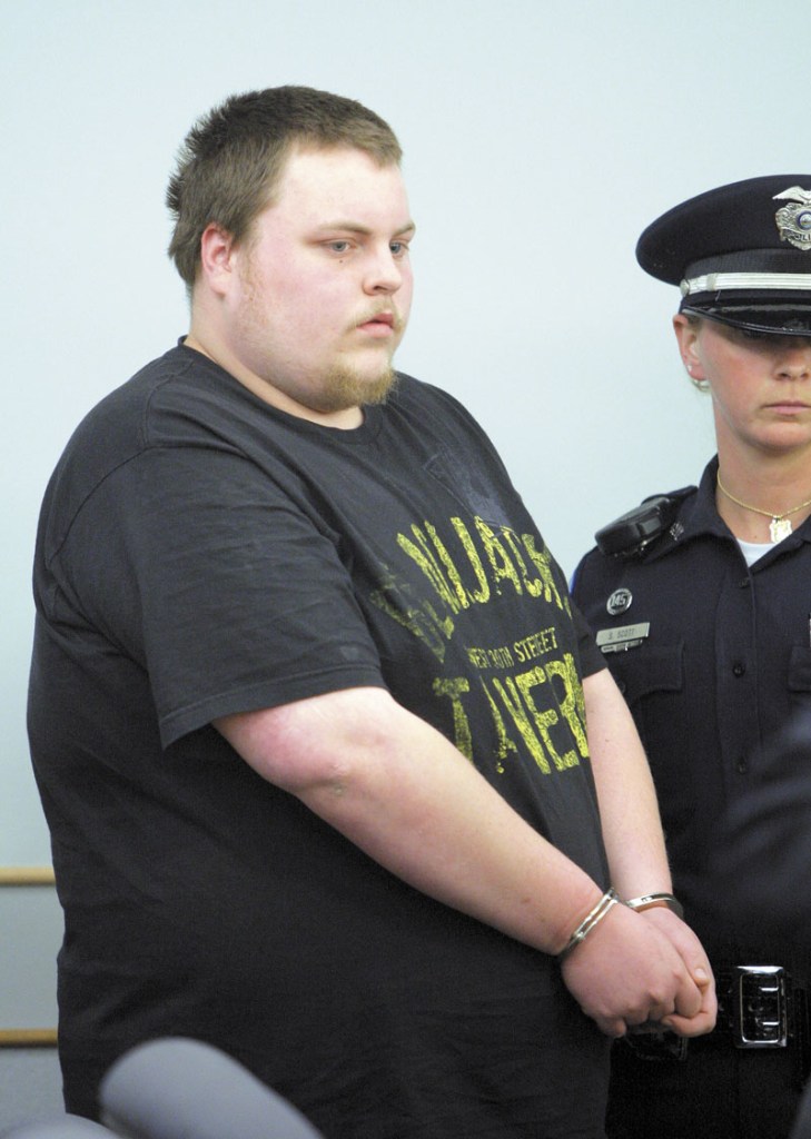 Trevor Ferguson, 23, is led in to Ossipee District Court in Ossipee, N.H. in May 2011. Ferguson was arraigned in connection with the death of Krista Dittmeyer.