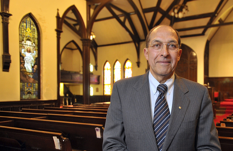 Frank Monsour, new owner of the Williston-West Church in Portland, stands in the sanctuary.