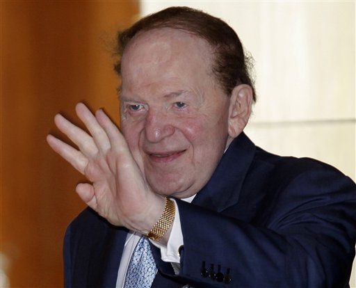 In this June 7, 2011, file photo shows Las Vegas Sands Chairman and CEO Sheldon Adelson waves in Hong Kong. After almost signle-handedly keeping alive Newt Gingrich's campaign for months, Adelson has given $10 million to a pro-Romney PAC. (AP Photo/Vincent Yu, File)