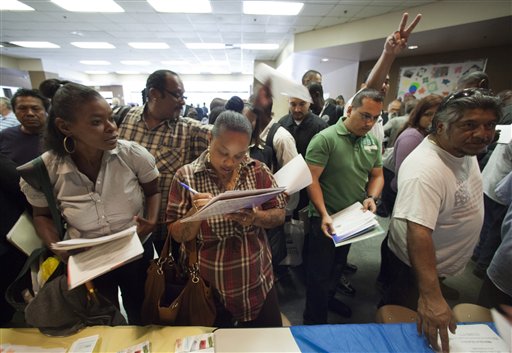 Job seekers gather for employment opportunities at the 11th annual Skid Row Career Fair at the Los Angeles Mission in Los Angeles on Thursday.