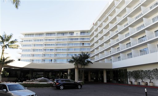 Police say two people have been found dead in what investigators believe was a murder-suicide in a room at the Beverly Hilton. The luxury hotel was also the site of Whitney Houston's death in February.