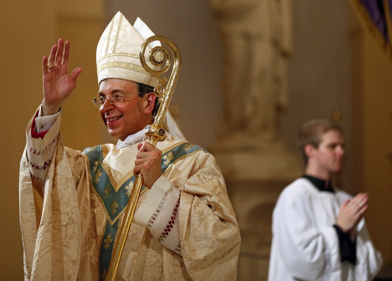 Baltimore Archbishop William Lori acknowledges parishioners after a liturgy in Baltimore on Thursday to kick off the “Fortnight for Freedom,” a two-week national campaign to draw attention to religious freedom.