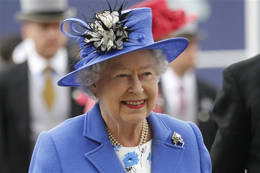 Britain's Queen Elizabeth II arrives for the Epsom Derby at Epsom race course, southern England, today at the start of a four-day celebration to mark the 60th anniversary of the queen's accession to the throne.