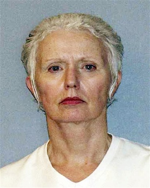 This undated file photo provided by the U.S. Marshals Service shows Catherine Greig, the longtime girlfriend of Whitey Bulger, captured with Bulger June 22, 2011, in Santa Monica, Calif. Greig was by Bulger's side for more than three decades, first as a secret girlfriend he kept on the side while he lived with another woman, then as the faithful woman who left behind her life in Massachusetts so she could go on the run with him. (AP Photo/U.S. Marshals Service, File) Catherine Greig