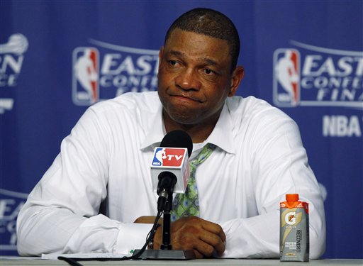 Boston Celtics coach Doc Rivers listens during a news conference after Game 7 of the NBA basketball playoffs Eastern Conference finals against the Miami Heat, Saturday, June 9, 2012, in Miami. The Heat defeated the Celtics 101-88. (AP Photo/Wilfredo Lee)