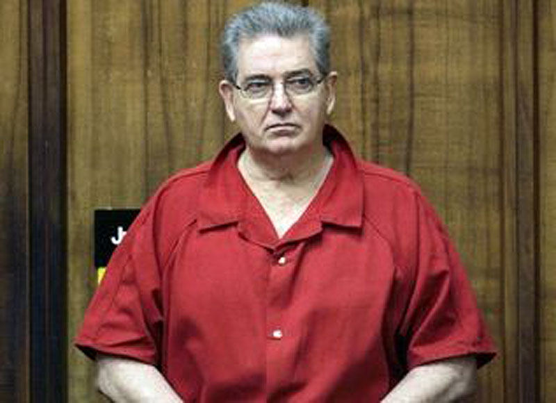 John Connolly stands after a hearing Thursday, Sept. 4, 2008 in Miami. Connolly says White Bulger has told police he wasn't involved in the murder of John Callahan, for which he was convicted. (AP File Photo)