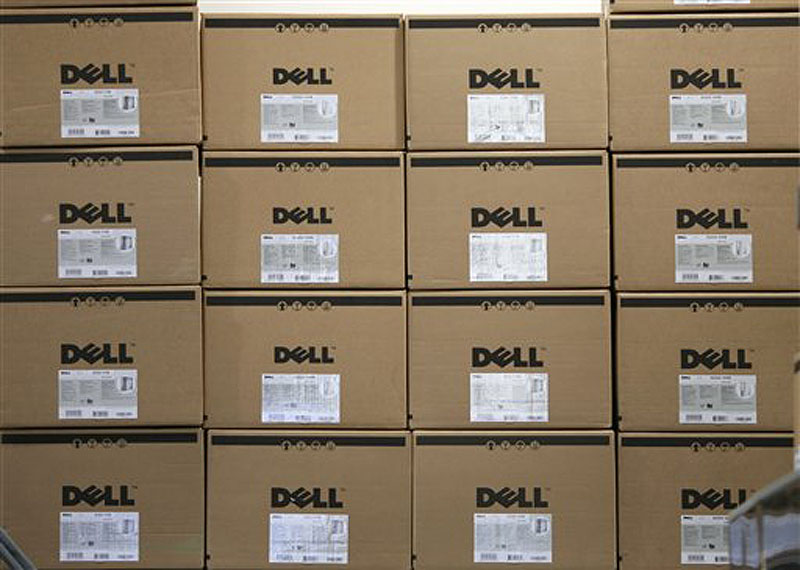 In this Aug. 16, 2008, file photo, boxes containing Dell computers are stacked on an upper shelf of a Best Buy store in Seekonk, Mass. Computer maker Dell Inc. annoucned Wednesday, June 13, 2012, that it is planning more than $2 billion in cost cuts over the next three years as its looks to transform its business so it can keep pace in the highly competitive technology sector. (AP Photo/Stew Milne)