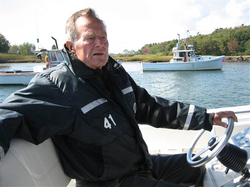 This undated image released by HBO shows former President George H.W. Bush on his boat in Kennebunkport, Maine during the filming of the documentary "41," premiering Thursday, June 14, at 9:00 p.m. EST on HBO. The USS George H.W. Bush aircraft carrier is coming to Maine this weekend. (AP Photo/HBO, Jeffrey Roth)
