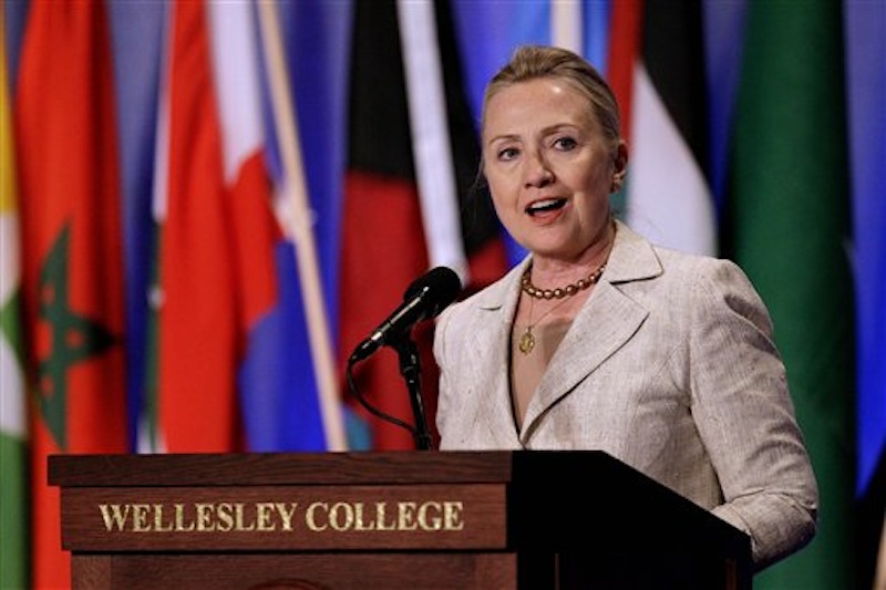 Secretary of State Hillary Rodham Clinton speaks a a gathering of the Women in Public Service Institute at her Alma mater, Wellesley College in Wellesley, Mass., Monday, June 11, 2012. (AP Photo/Stephan Savoia)