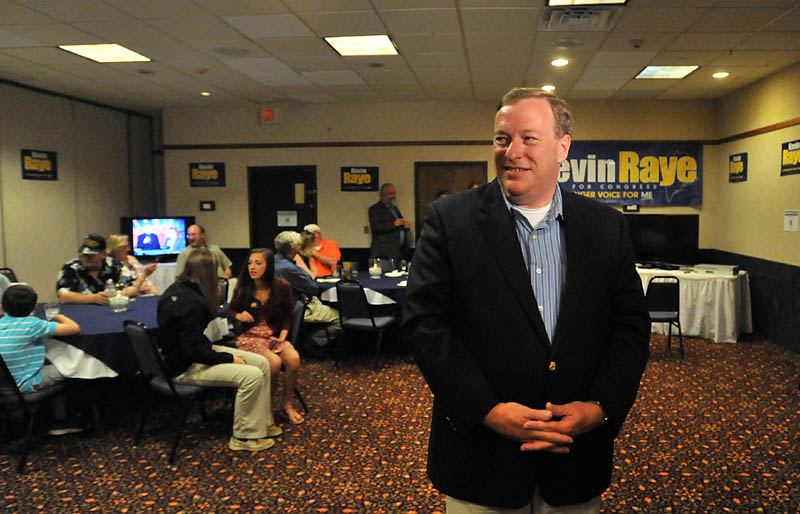 Staff photo by Michael G. Seamans Kevin Raye, candidate for US second congressional district, speaks to media at the Ramada Inn in Bangor Tuesday night.