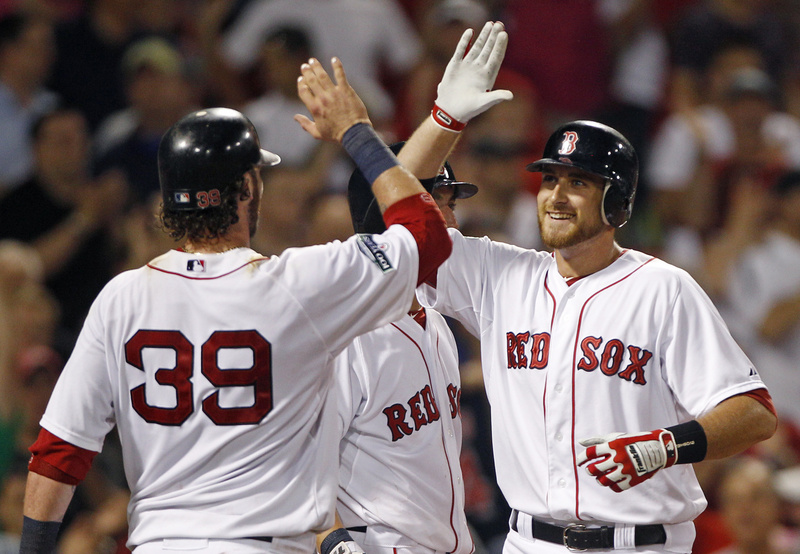 Red Sox catcher Jarrod Saltalamacchia (39) congratulates Will Middlebrooks, right, who hit a two-run homer against the Miami Marlins in the eighth inning at Fenway Park on Thursday.