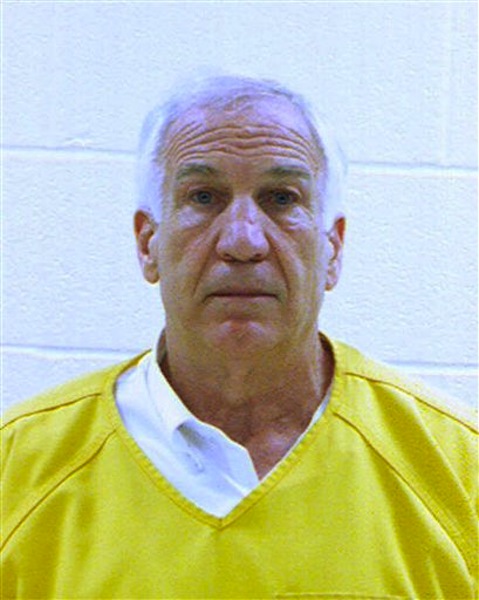In this booking photo released early Saturday morning June 23, 2012 by the Centre County Correctional Facility in Bellefonte, Pa., former Penn State University assistant football coach Jerry Sandusky is shown. Sandusky was convicted on Friday, June 22, 2012, of sexually assaulting 10 boys over 15 years Friday, accusations that had sent shock waves through the college campus known as Happy Valley and led to the firing of Penn State's beloved Hall of Fame coach, Joe Paterno.. (AP Photo/Centre County Correctional Facility)