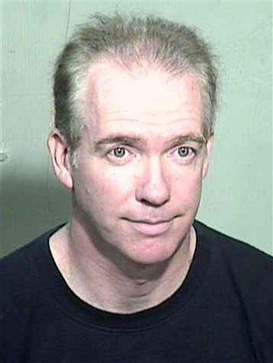 In this undated photo provided by the Maricopa County Sheriff's Office, 53-year-old Michael Marin is shown. The former Wall Street trader and attorney is suspected of fatally poisoning himself as he was found guilty of arson of an occupied structure in a Phoenix courtroom on June 28, 2012. (AP Photo/Maricopa County Sheriff)