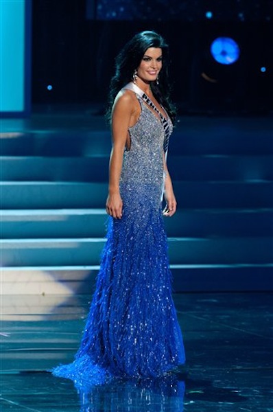 In this photo provided by the Miss Universe Organization, Miss Pennsylvania Sheena Monnin competes during the 2012 Miss USA Presentation Show on Wednesday, May 30, 2012 in Las Vegas. Monnin resigned her crown claiming the contest is rigged, but according to organizers the beauty queen was upset over the decision to allow transgender contestants to enter. A posting on Monninís Facebook page claims another contestant learned the names of the top 5 finishers on Sunday morning, hours before the show was broadcast. (AP Photo/Miss Universe Organization, Darren Decker) Miss USA 2012;Presentation Show;Evening Gown