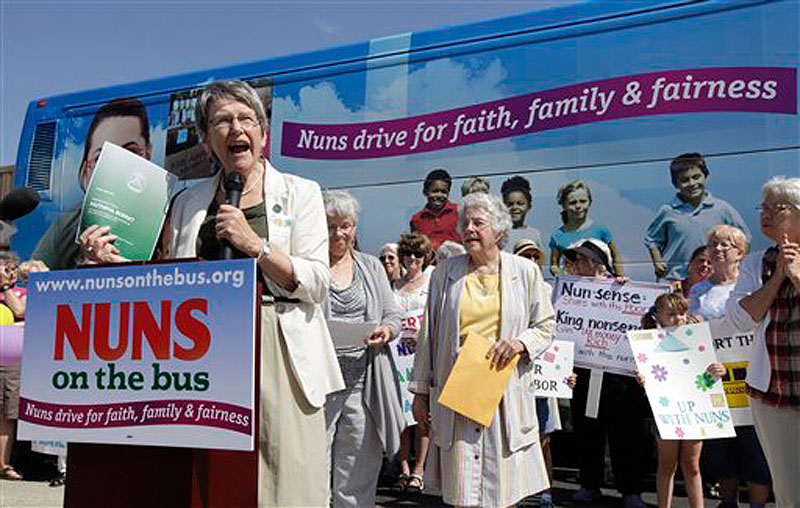 Sister Simone Campbell, executive director of Network, speaks during a stop on the first day of a 9-state Nuns on the Bus tour, Monday, June 18, 2012, in Ames, Iowa. The group of Roman Catholic nuns say theyíre not opposing any particular candidate but that their fight is with a Republican proposed federal budget they say hurts the poor and needy. (AP Photo/Charlie Neibergall)