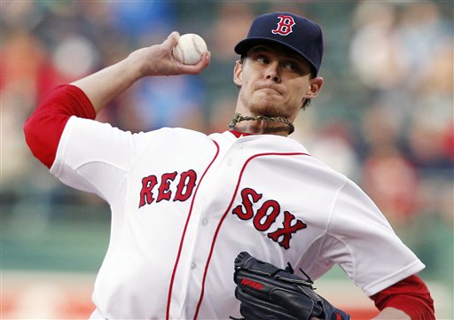 Boston Red Sox starting pitcher Clay Buchholz pitches against the Baltimore Orioles in Boston on Thursday. Buchholz went nine innings, and the Red Sox won, 7-0.