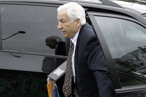 Former Penn State University assistant football coach Jerry Sandusky arrives for the second day his trial at the Centre County Courthouse in Bellefonte, Pa., today.