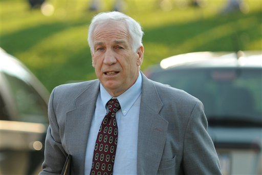 Jerry Sandusky arrives today at the Centre County Courthouse, in Bellefonte, Pa. He is charged with 48 counts related to 10 boys over 15 years. He has repeatedly denied the allegations.