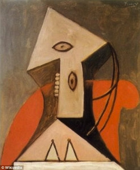 "Woman in a Red Armchair" by Pablo Picasso.