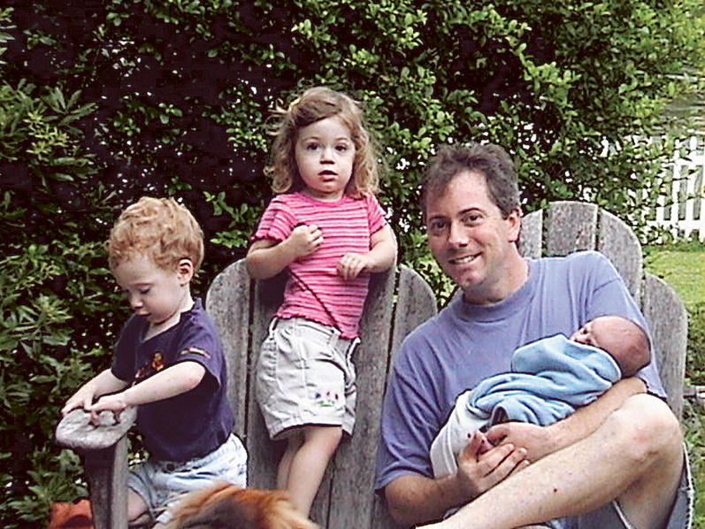 Nick with his own children, Turner, Kyla and baby Evan.