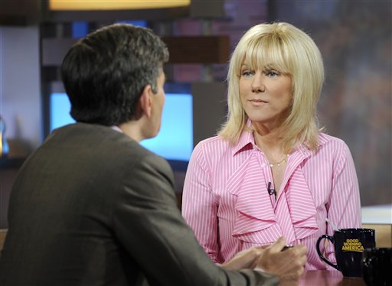 This image released by ABC shows co-host George Stephanopolous, left, speaking with Rielle Hunter during an interview on the morning show "Good Morning America," Tuesday, June 26, 2012 in New York. Hunter says she and former presidential candidate John Edwards have ended their relationship. Hunter told ABC's "Good Morning America" on Tuesday that she and Edwards were still a couple until late last week, as details from Hunter's memoir "What Really Happened: John Edwards, Our Daughter and Me," became public. The breakup was painful, but Hunter said Edwards will still be involved with their daughter, Quinn, who is 4 years old and lives with Hunter. (AP Photo/ABC, Ida Mae Astute) GM12
