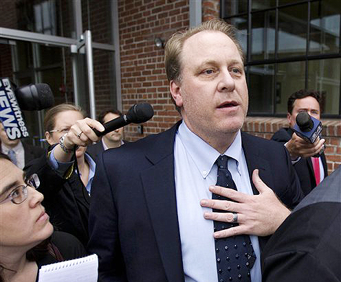 Former Boston Red Sox pitcher Curt Schilling departs the Rhode Island Economic Development Corporation headquarters, in Providence, In this May 16, 2012, photo.