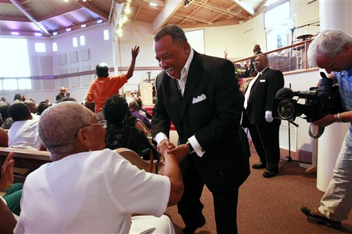 The Rev. Fred Luter, pastor of the Franklin Avenue Baptist Church in New Orleans, greets congregation members during Sunday services.
