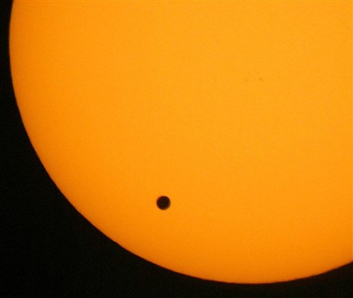 This June 8, 2004, photo shows the transit of Venus, which occurs when the planet Venus passes between the Earth and the Sun. Tuesday will be the last transit for more than 100 years.