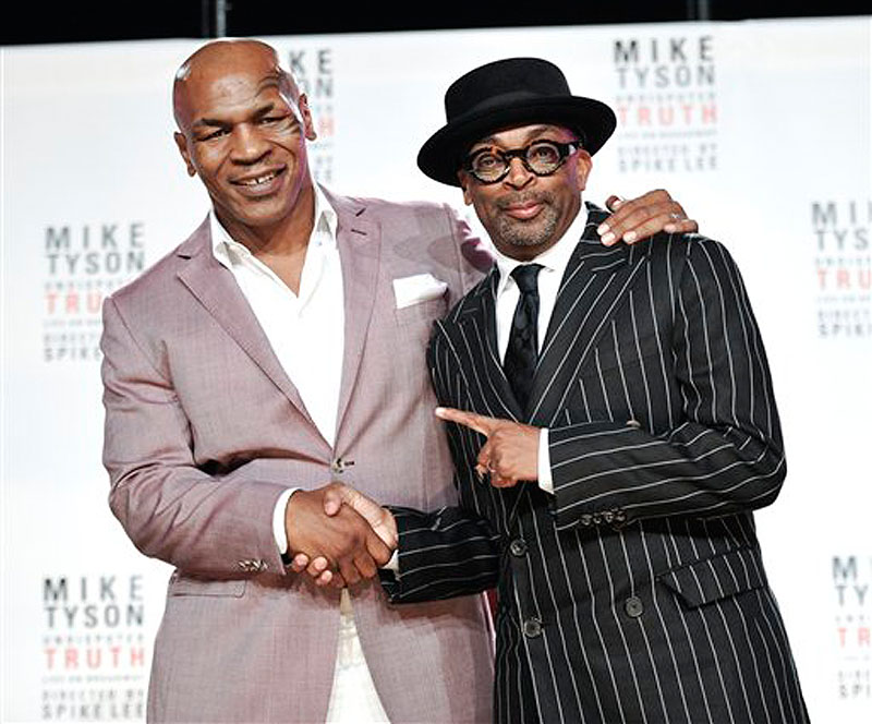 Former heavyweight boxer Mike Tyson, left, and director Spiken Lee announce "Mike Tyson: Undisputed Truth", a one man show on Broadway starring Mike Tyson, on Monday June 18, 2012 in New York. (Photo by Evan Agostini/Invision) Half Length
