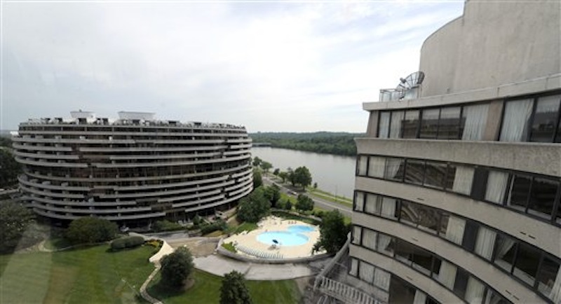 This photo taken May 30, 2012 shows a view of the Watergate complex from the top floor of the Watergate Office Building in Washington Forty years ago police in Washington arrested five men breaking in to the Democratic National Committee offices in Washington. The name of the complex they were breaking into became infamous: the Watergate. These days, though, unless you know where to look, thereís little marking the location of the 1972 crime that ultimately led to the resignation of President Richard Nixon. The office building that was the site of the break in is still in use, though the tenants have changed. The adjacent hotel where the burglars stayed is currently closed. And another hotel across the street where a lookout waited with a walkie-talkie, monitoring the burglars' progress, has been turned into a college dorm. (AP Photo/Susan Walsh)