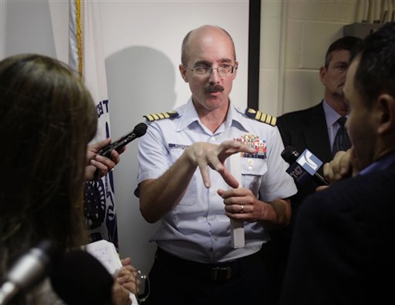 Deputy Commander of Coast Guard Sector New York Capt. Gregory Hitchen speaks to reporters after a news conference in New York, Tuesday, June 12, 2012. The Coast Guard says a reported explosion on a motor yacht off central New Jersey likely was a hoax and that an extensive search and rescue operation cost hundreds of thousands of dollars. (AP Photo/Seth Wenig)