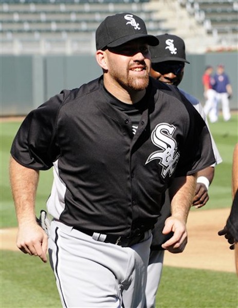 New Chicago White Sox third baseman Kevin Youkilis runs during warmups prior to a baseball game against the Minnesota Twins, Monday, June 25, 2012, in Minneapolis. Youkilis was traded to the White Sox on Sunday from the Boston Red Sox. (AP Photo/Jim Mone)