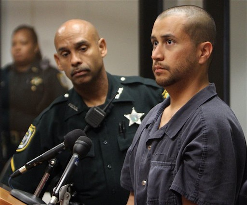 In this Thursday, April 12, 2012 file photo, George Zimmerman, charged with killing 17-year-old Trayvon Martin, right, stands next to a Seminole County Deputy during a court hearing in Sanford, Fla. A judge on Friday, June 1, 2012 revoked Zimmerman's bond and ordered him returned to jail within 48 hours. Circuit Judge Kenneth Lester said Zimmerman misled the court about how much money he had available when his bond was set for $150,000 in April. Prosecutors claim Zimmerman had $135,000 available that had been raised by a website he set up. (AP Photo/Gary W. Green, Orlando Sentinel, Pool)