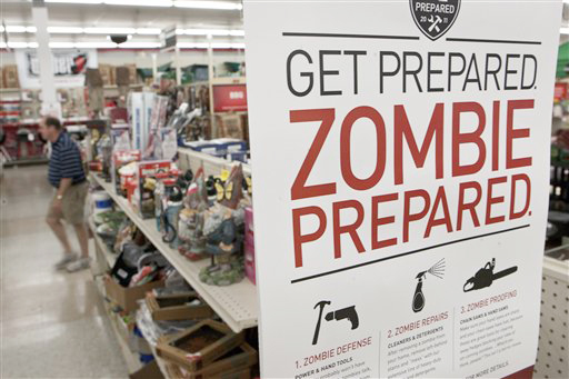 A sign promoting zombie preparedness is displayed in a hardware store in Omaha, Neb. After several gory incidents that have been reported around the country recently, online zombie talk has grown.