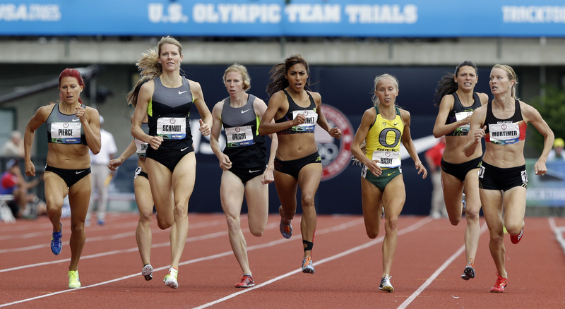 Anna Pierce of Greenwood, left, keeps pace with the leaders heading down the stretch in a 1,500 meters heat Friday and qualified for the finals by finishing fourth. She will be looking for a spot on the Olympic team when she races in the finals Sunday.