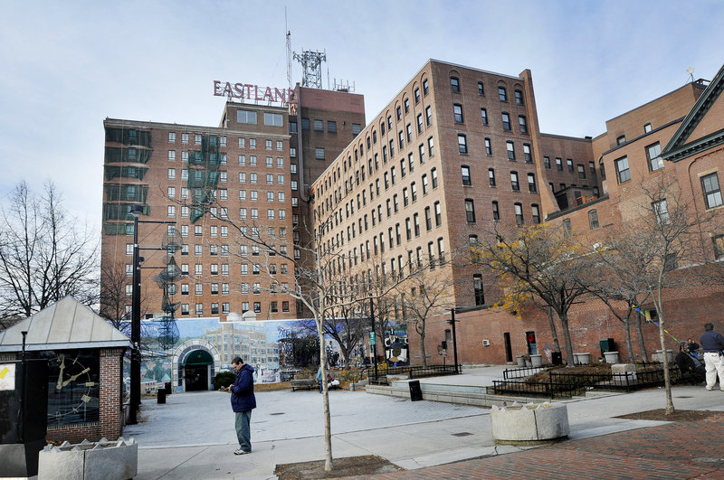 In this November 2011 file photo, the Eastland Park Hotel rises above Congress Plaza at the corner of High and Congress streets.