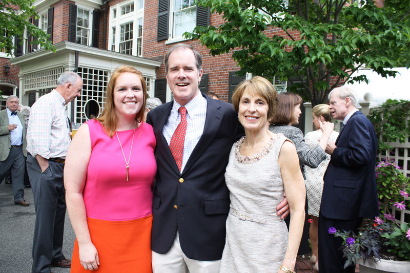 Kat Whelan stands with her parents Bob and Kathy Whelan behind their colonial revival West End home, which was the site of this year’s Historic Home Gala.