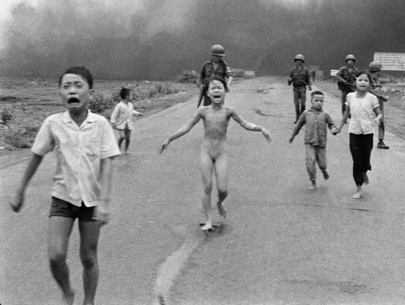 In 1972, Phuc became a tragic symbol of the Vietnam War when she was photographed running down a South Vietnamese road after a napalm attack.