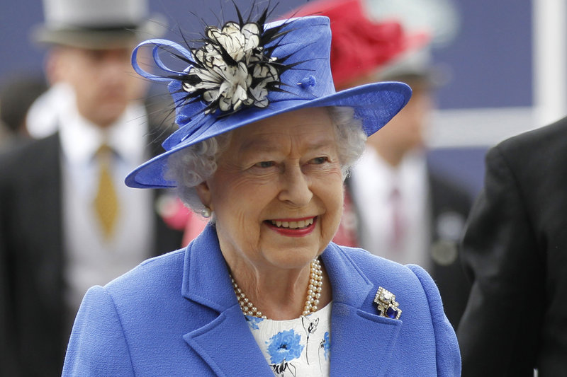 Britain’s Queen Elizabeth II arrives for the Epsom Derby at Epsom race course, southern England, at the start of a four-day Diamond Jubilee celebration.