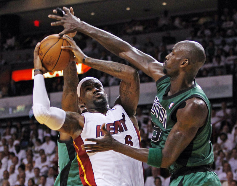 Kevin Garnett, right, is mixing it up on the inside with LeBron James and the Heat as the Celtics are playing with a fervor that belies their age.