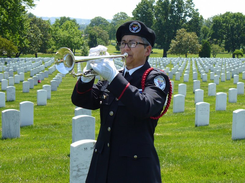 Carla Beaudoin joined other members of Bugles Across America May 19 to play “Taps” at Arlington National Cemetery in celebration of the 150th anniversary of the piece.