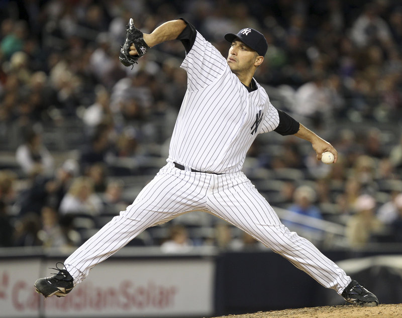 Andy Pettitte throws a pitch in Tuesday night’s 7-0 win over the Tampa Bay Rays at Yankee Stadium. Pettitte improved to 3-1 at home this season with an ERA of 1.88 in the four starts.