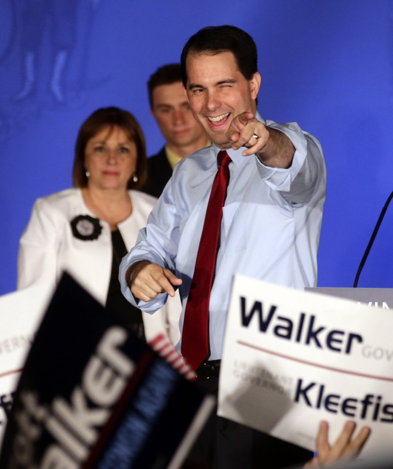 Wisconsin Republican Gov. Scott Walker reacts at his victory party Tuesday in Waukesha, Wis., after defeating Democratic challenger Tom Barrett in a recall election. In almost all respects, the voters Tuesday resembled those of the 2010 election, only there were more of them.