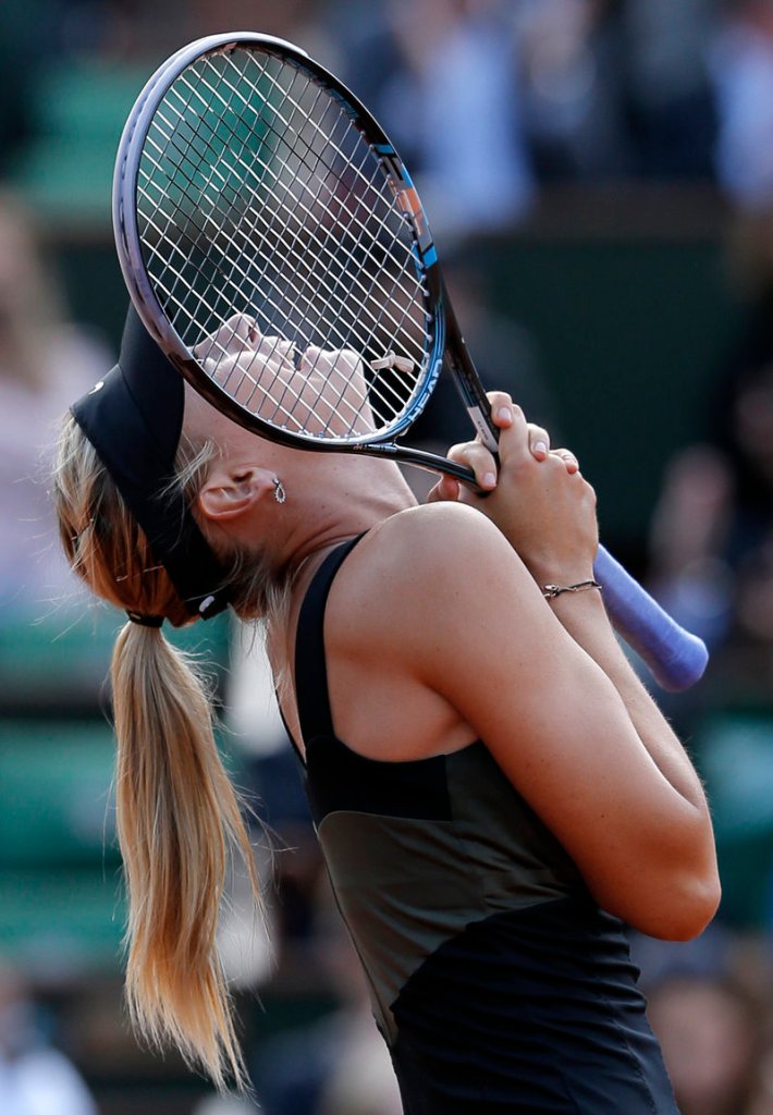 Maria Sharapova celebrates after beating Petra Kvitova 6-3, 6-3 in Thursday’s semifinals of the French Open in Paris.