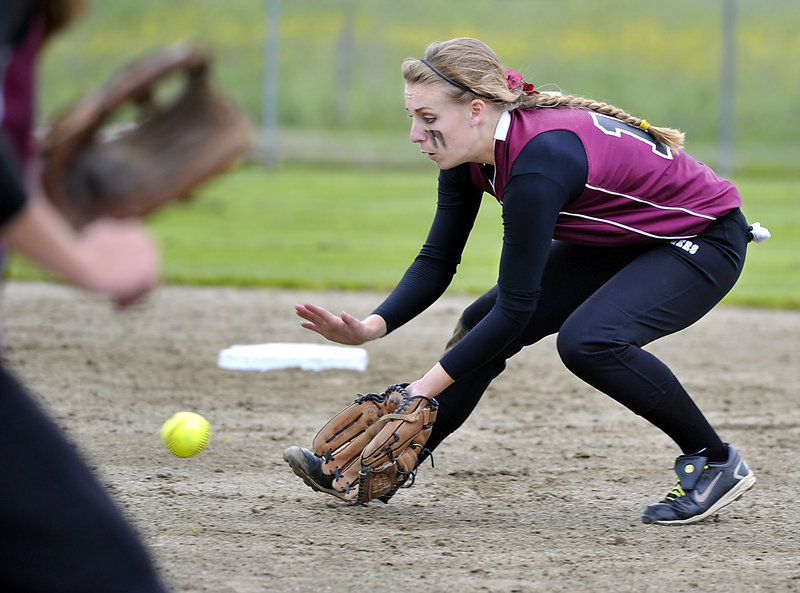 Second baseman Elyse Dinan, who went 3 for 4 with a homer for Greely, fields a grounder before throwing to first for an out during the 6-0 victory against Cape Elizabeth.