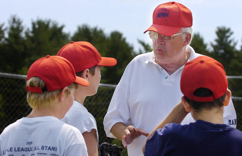 Ron Farr works with members of an all-star team at practice at the Portland North Little League field at Lyman Moore Middle School prior to their first game in July 2006. Overall, Farr has coached 20 all-star teams for the league.