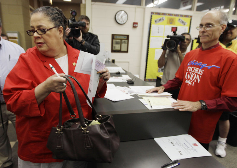 Chicago Teachers Union President Karen Lewis casts her ballot during a strike authorization vote at a Chicago high school this week. The results will be known next week.