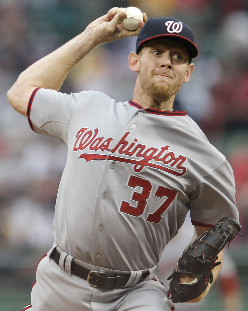 Stephen Strasburg fell one strikeout short of his career high Friday night, collecting 13 in a 7-4 victory against the Boston Red Sox at Fenway Park.