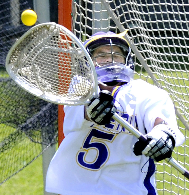 Cheverus goalie Hope Correia makes a save Saturday in an Eastern Class A semifinal against Messalonskee. Cheverus won 10-9, and will play top-seeded Brunswick in the regional final Wednesday.