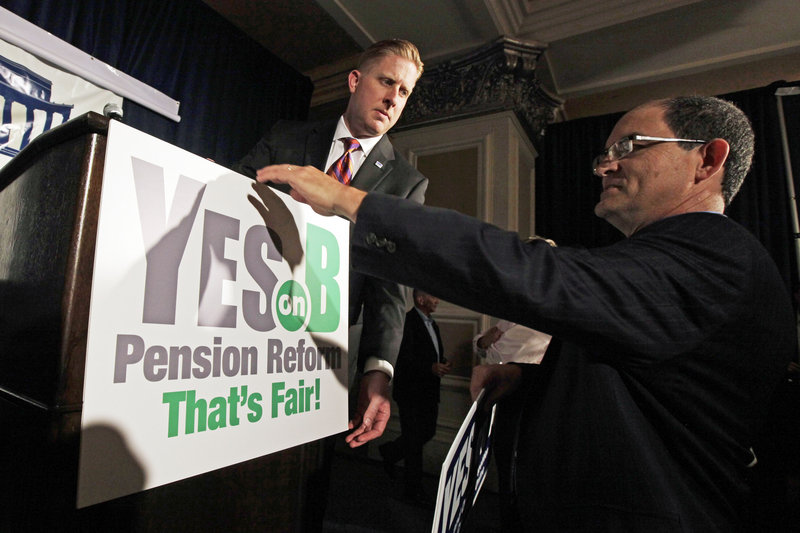 Backers of a proposal to roll back public pensions prepare for a rally Tuesday in San Diego. A similar proposal was also on the ballot in San Jose, and voters in both cities supported the measures. Legal challenges have been filed in both cities.